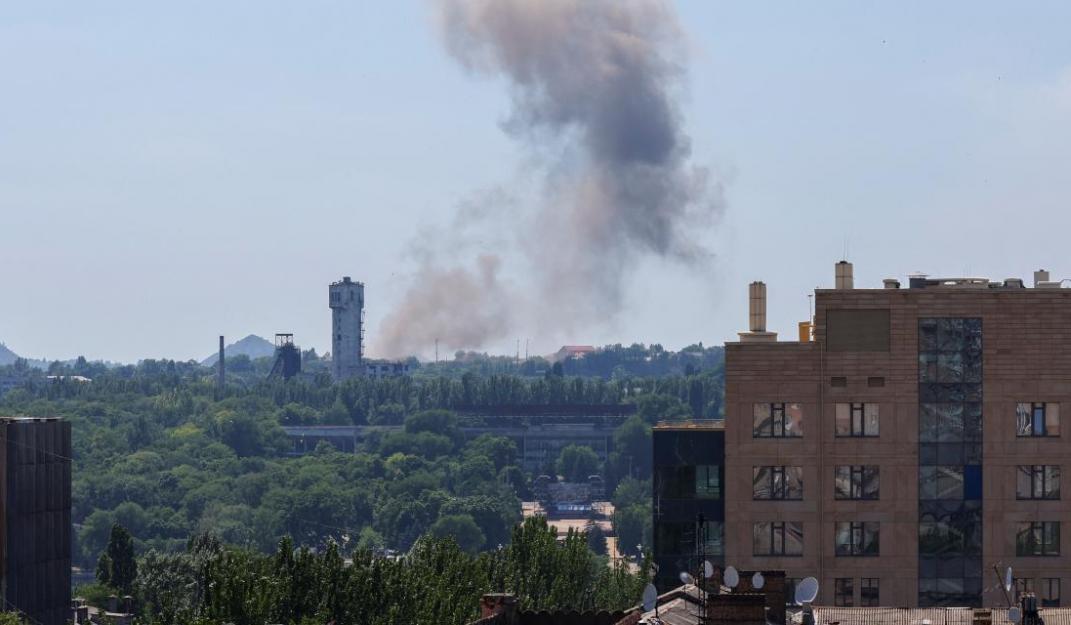 Source: Smoke rises over the city following recent shelling in the course of Ukraine-Russia conflict in Donetsk, Ukraine June 20, 2022. REUTERS