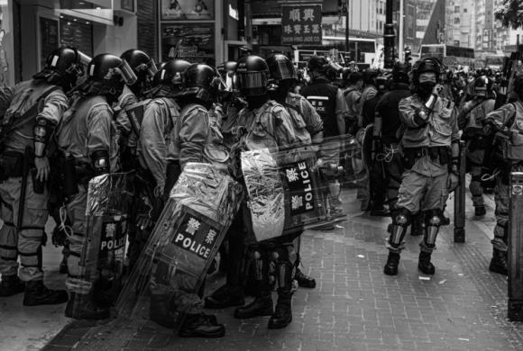 Hong Kong police during the 2019 protests. Photo courtesy of Jonathan van Smit.