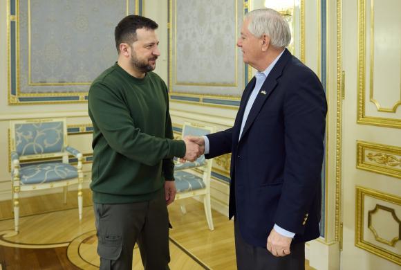 Volodymyr Zelensky shakes hands with US Senator Lindsey Graham in Kyiv, 18 March 2024. Photo: President of Ukraine via Wikimedia Commons, CC0